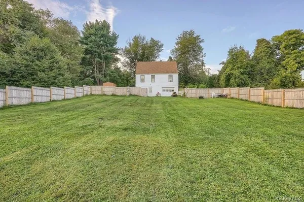 a house with a garden in front of it