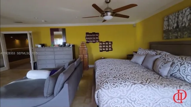 a bedroom with a bed and furniture
