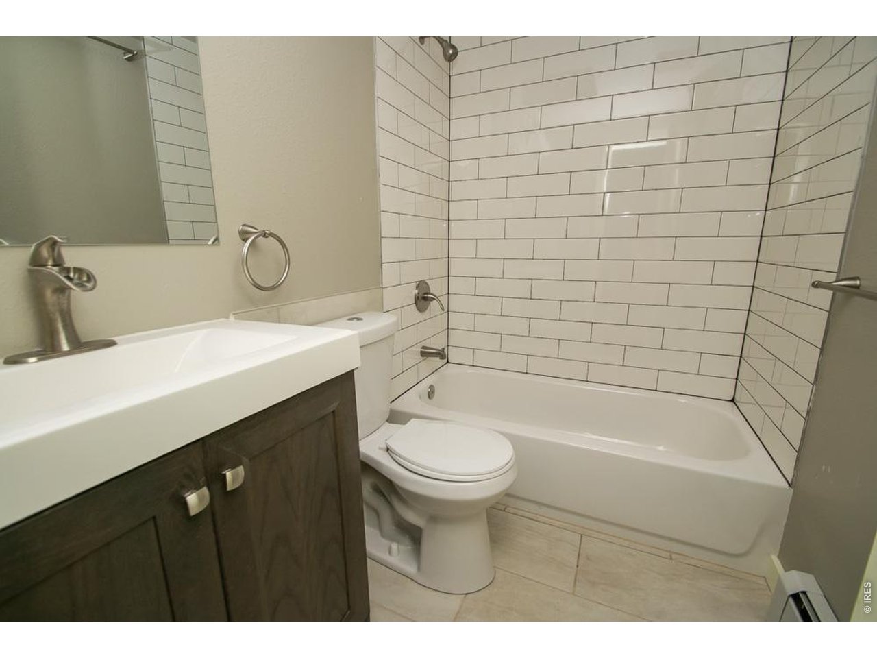 1806 17th Street Boulder, CO 80302 - Photo 17 of 45 a bathroom with a sink a toilet and shower