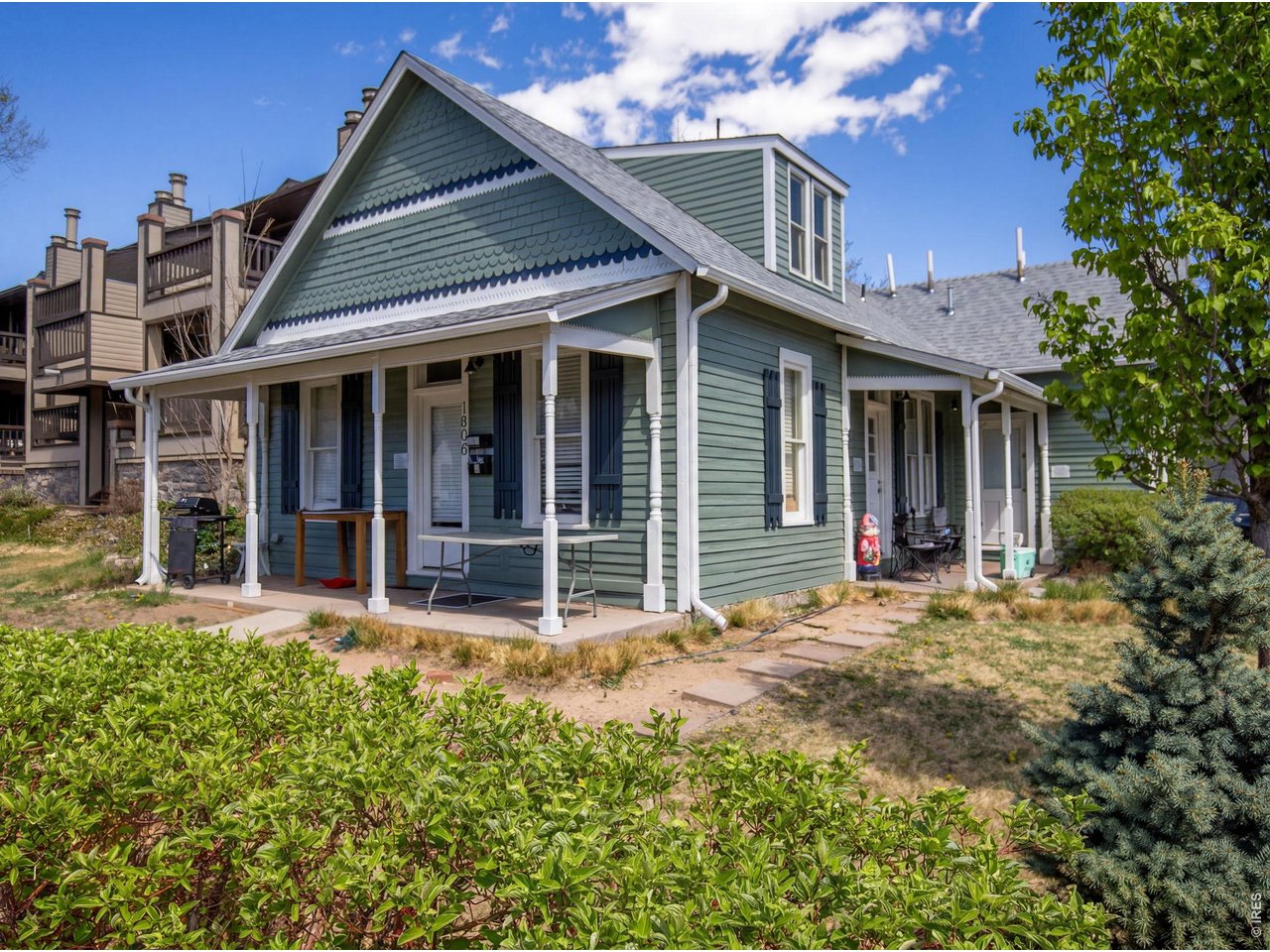 1806 17th Street Boulder, CO 80302 - Photo 2 of 45 front view of a house with a small yard