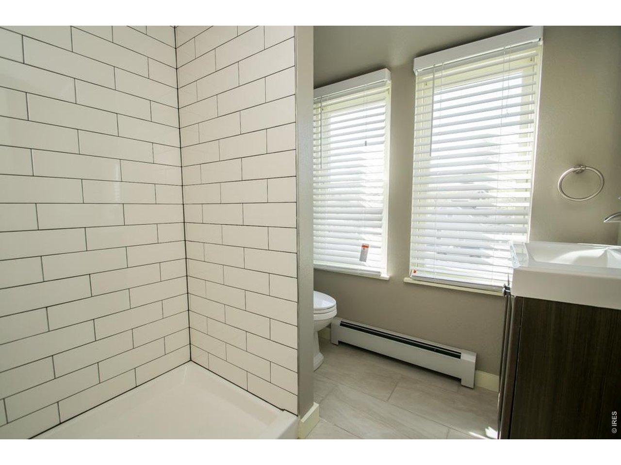 1806 17th Street Boulder, CO 80302 - Photo 26 of 45 a bathroom with a sink and a bathtub