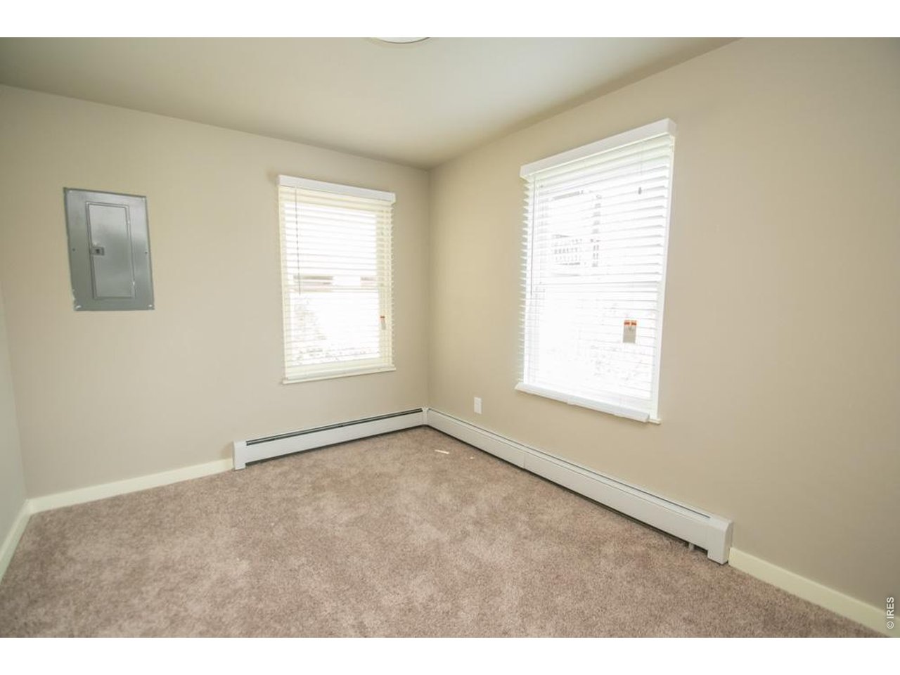 1806 17th Street Boulder, CO 80302 - Photo 34 of 45 a view of an empty room with a window