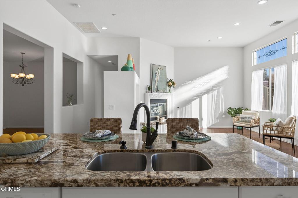2914 Naples Drive Oxnard, CA 93035 - Photo 16 of 51 a kitchen with a sink and a stove top oven