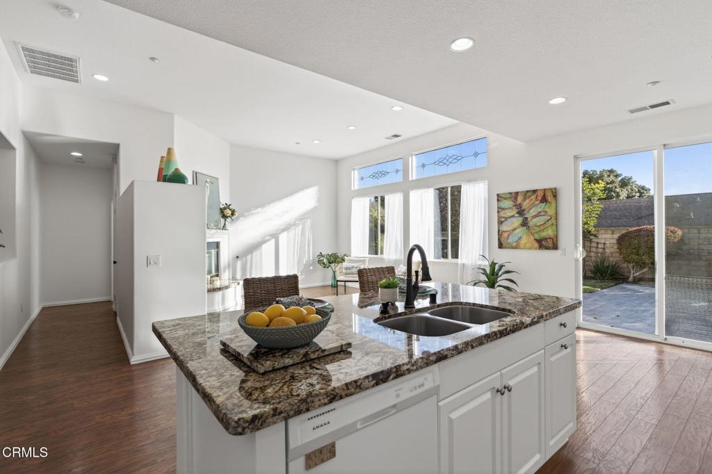 2914 Naples Drive Oxnard, CA 93035 - Photo 17 of 51 a kitchen with counter top space and living room