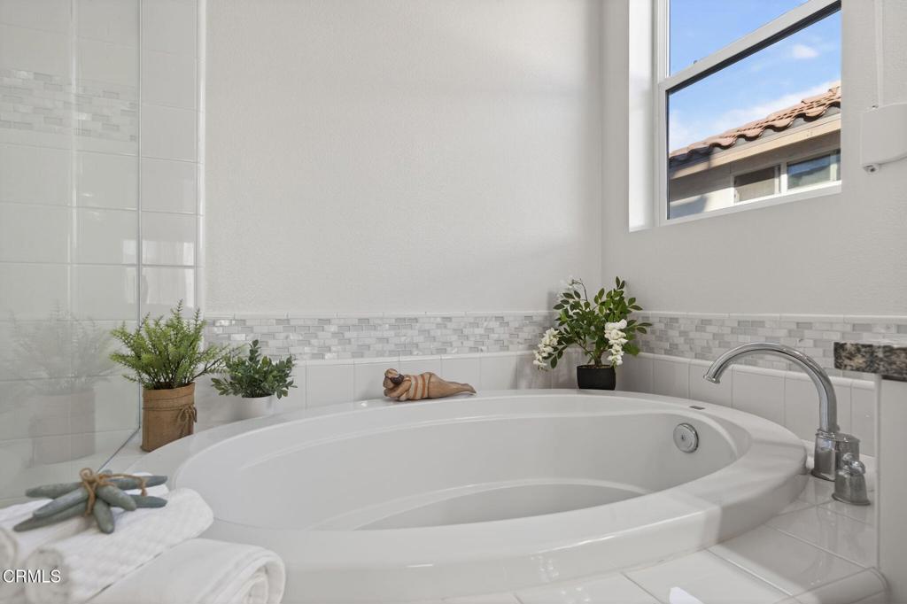 2914 Naples Drive Oxnard, CA 93035 - Photo 25 of 51 a white bath tub sitting in a bathroom