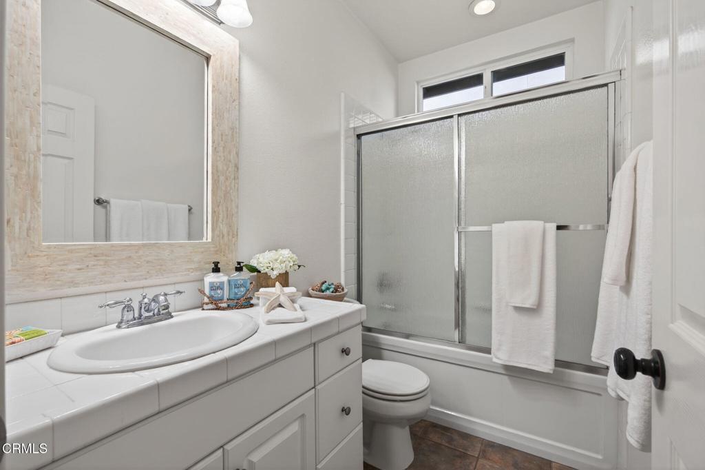 2914 Naples Drive Oxnard, CA 93035 - Photo 30 of 51 a bathroom with a sink toilet and shower