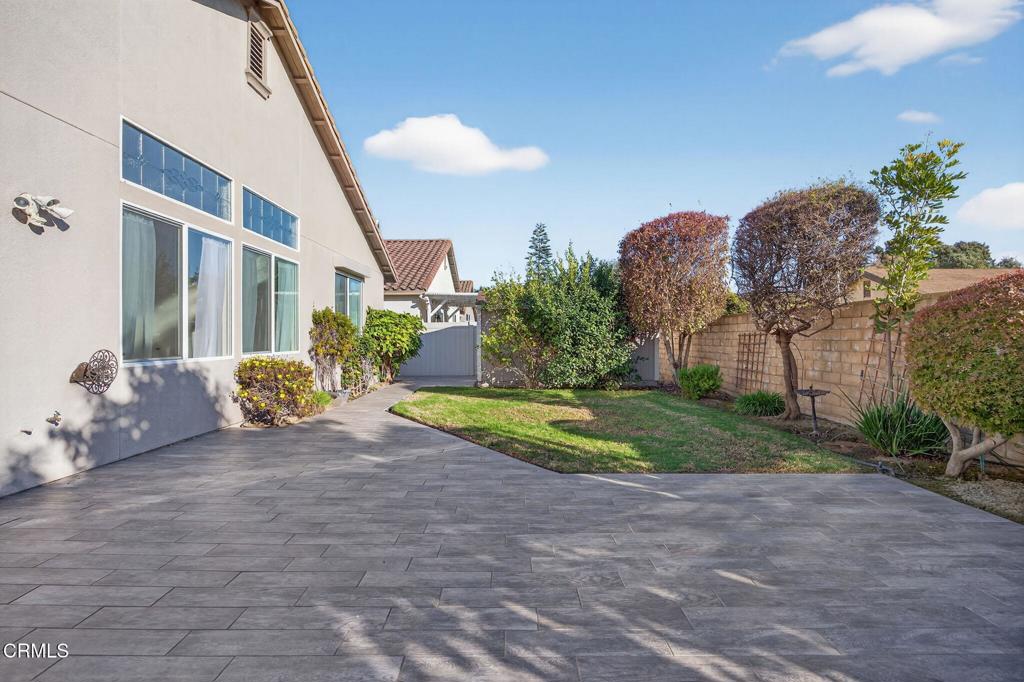 2914 Naples Drive Oxnard, CA 93035 - Photo 34 of 51 a view of a house with a yard and a fountain