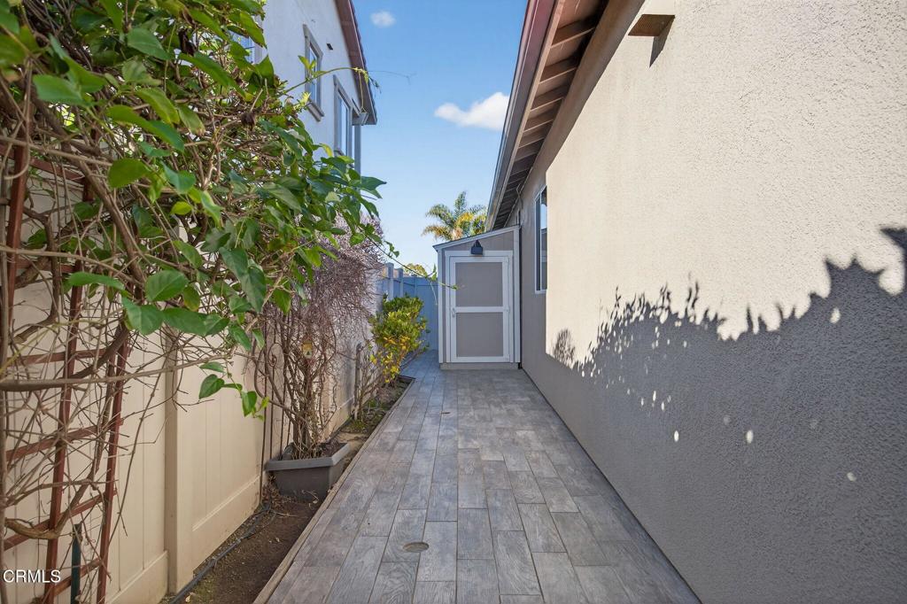2914 Naples Drive Oxnard, CA 93035 - Photo 37 of 51 a view of a pathway of a house with a tree