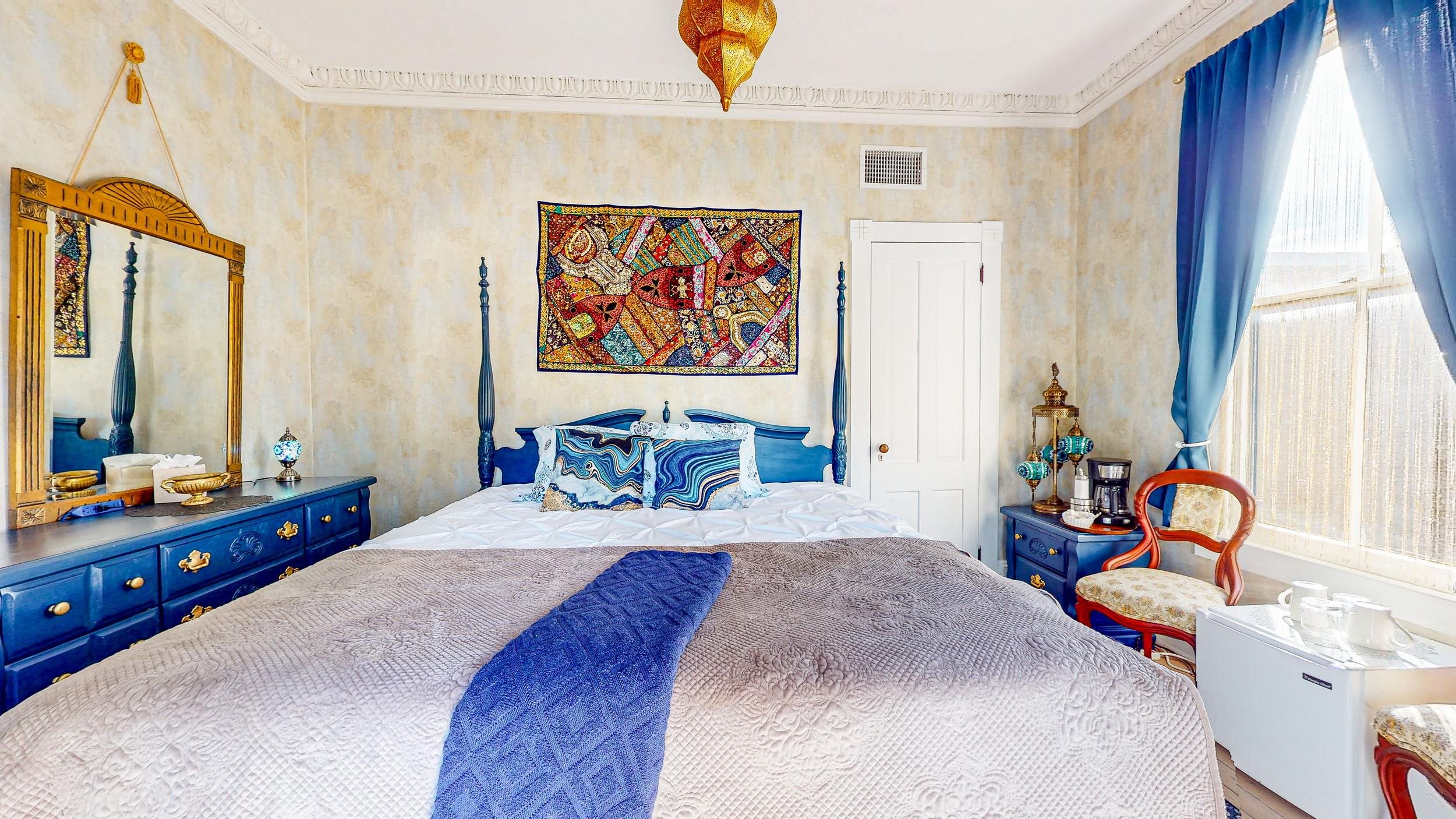 63 Orange Street St. Augustine, FL 32084 - Photo 26 of 74 a bedroom with a bed and window