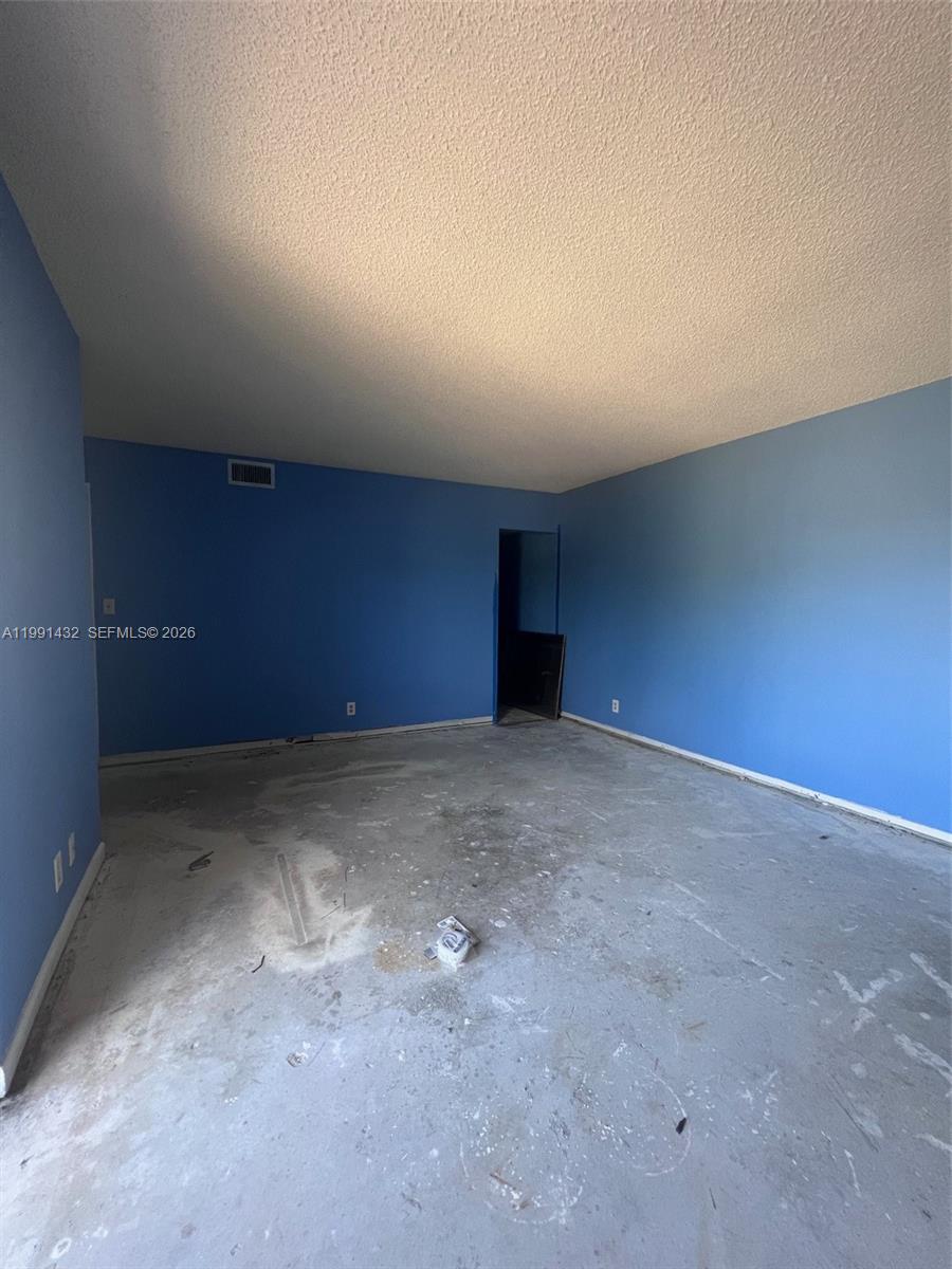 4681 Cherry Road West Palm Beach, FL 33417 - Photo 21 of 33 a view of an empty room