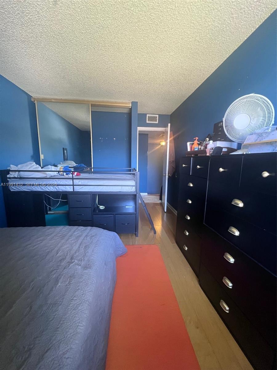 4681 Cherry Road West Palm Beach, FL 33417 - Photo 33 of 33 a swimming pool view with a double vanity sink and a mirror