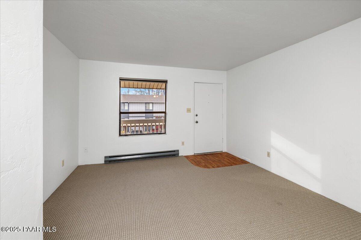 849 Sunset Avenue Prescott, AZ 86305 - Photo 21 of 30 an empty room with windows