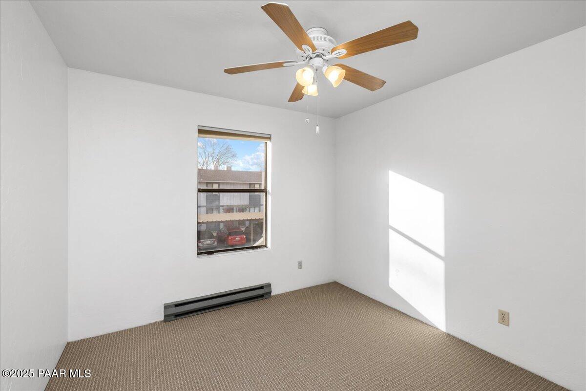 849 Sunset Avenue Prescott, AZ 86305 - Photo 30 of 30 an empty room with a window