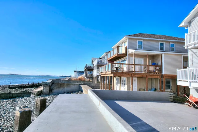 a view of a house with roof deck