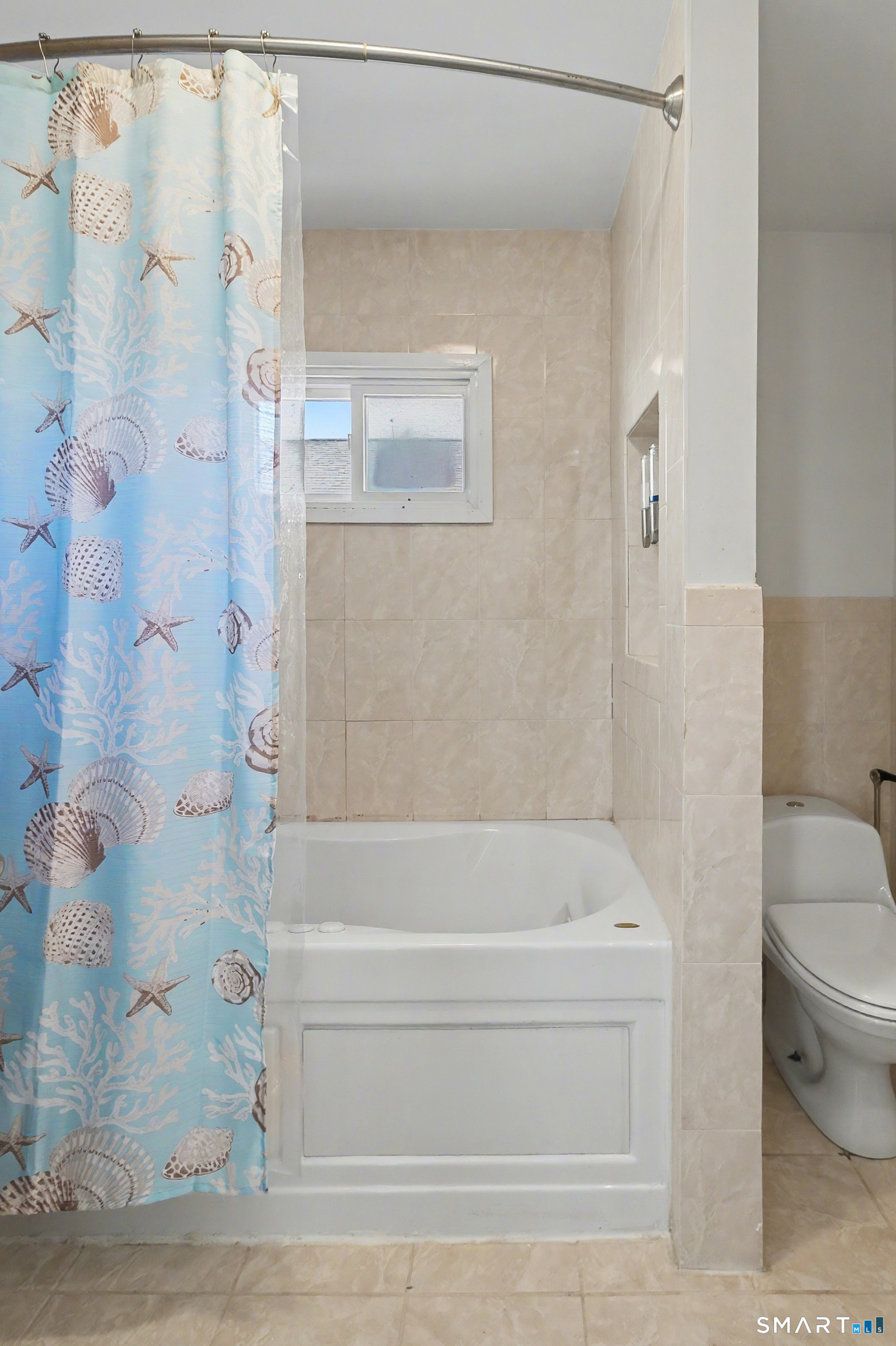 51 Point Beach Drive Milford, CT 06460 - Photo 22 of 32 a bathroom with a bathtub and a shower