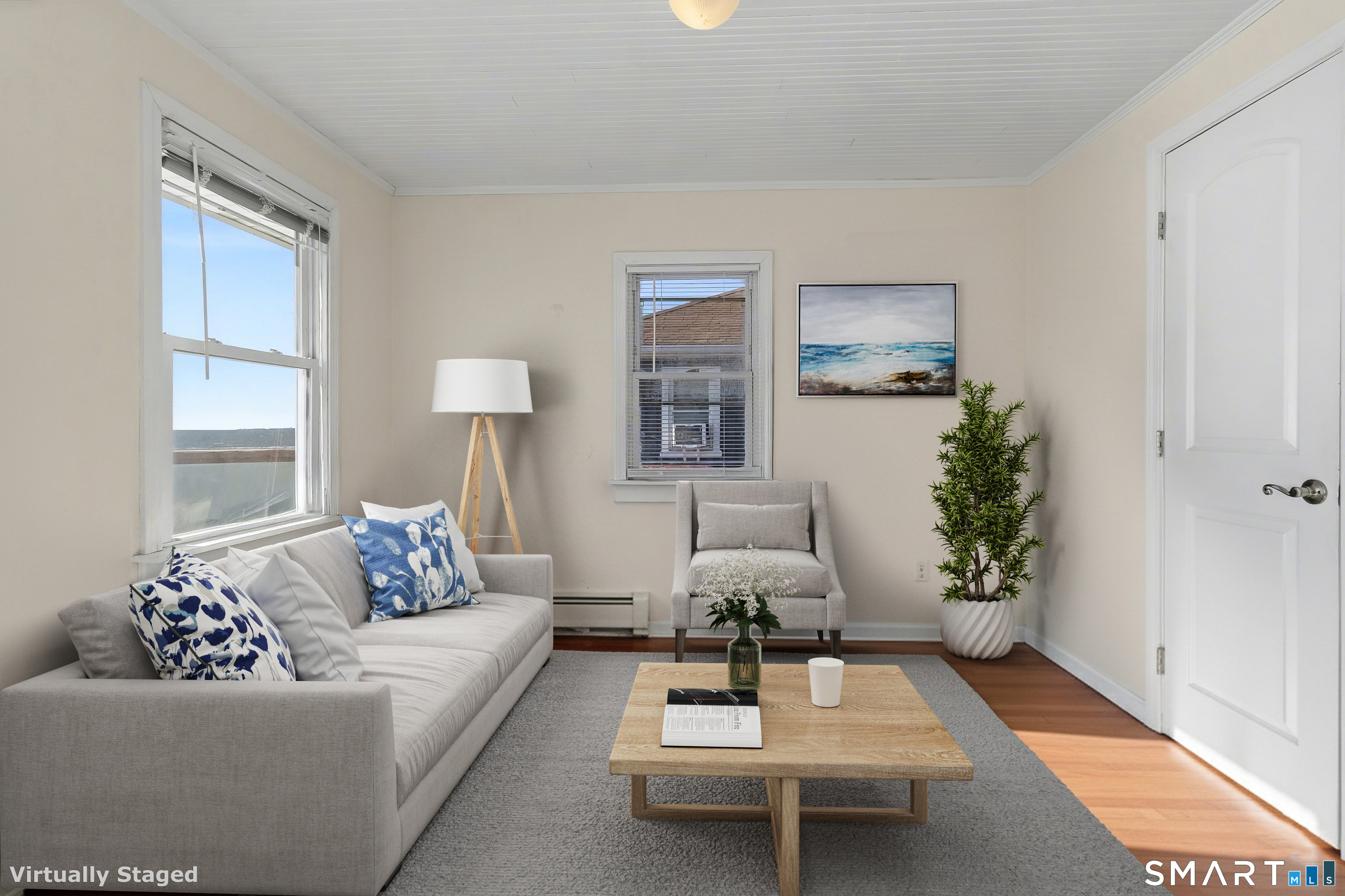 51 Point Beach Drive Milford, CT 06460 - Photo 22 of 36 Staged bedroom sitting area