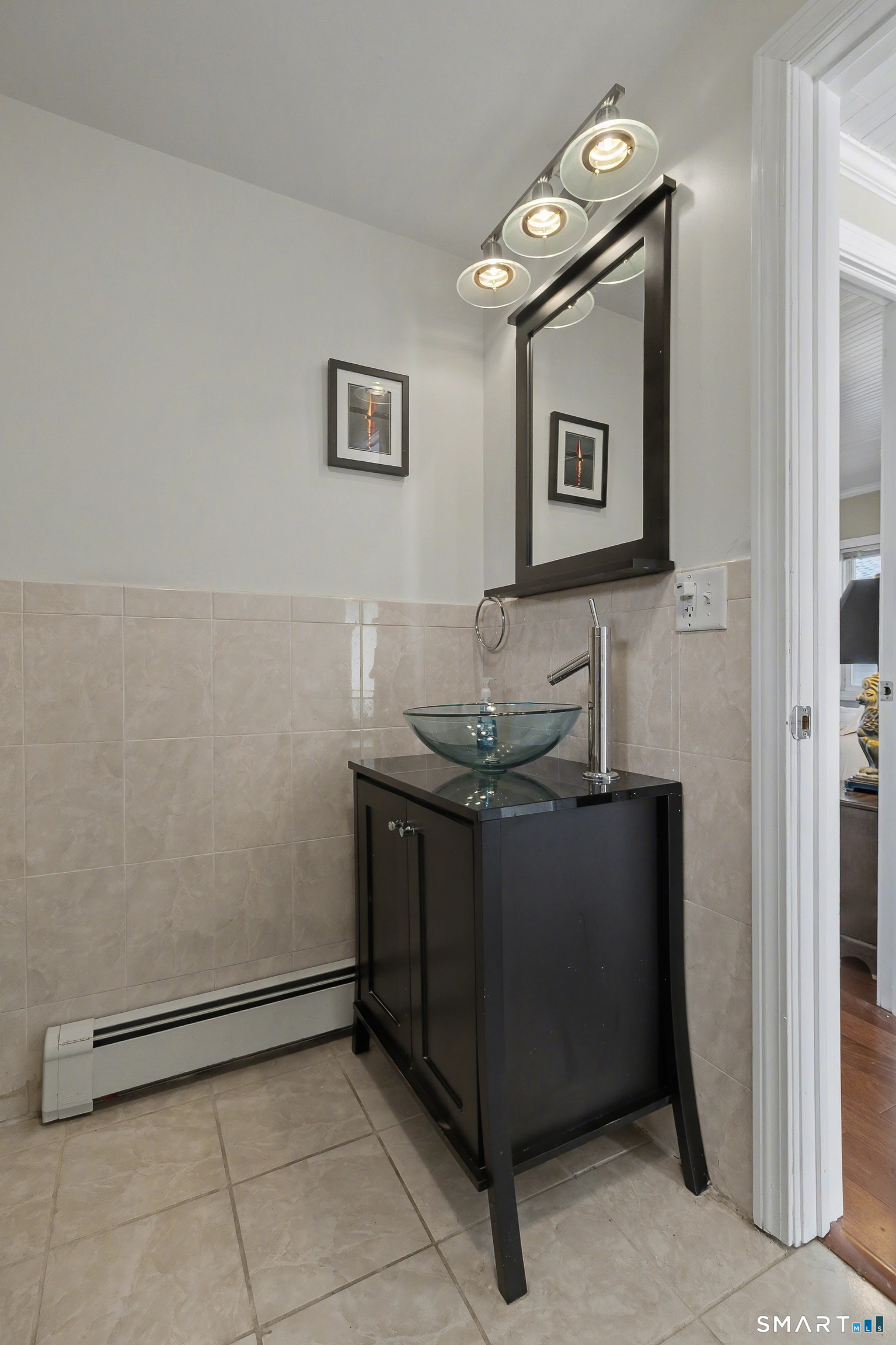 51 Point Beach Drive Milford, CT 06460 - Photo 23 of 32 a room with granite countertop a sink and a stove