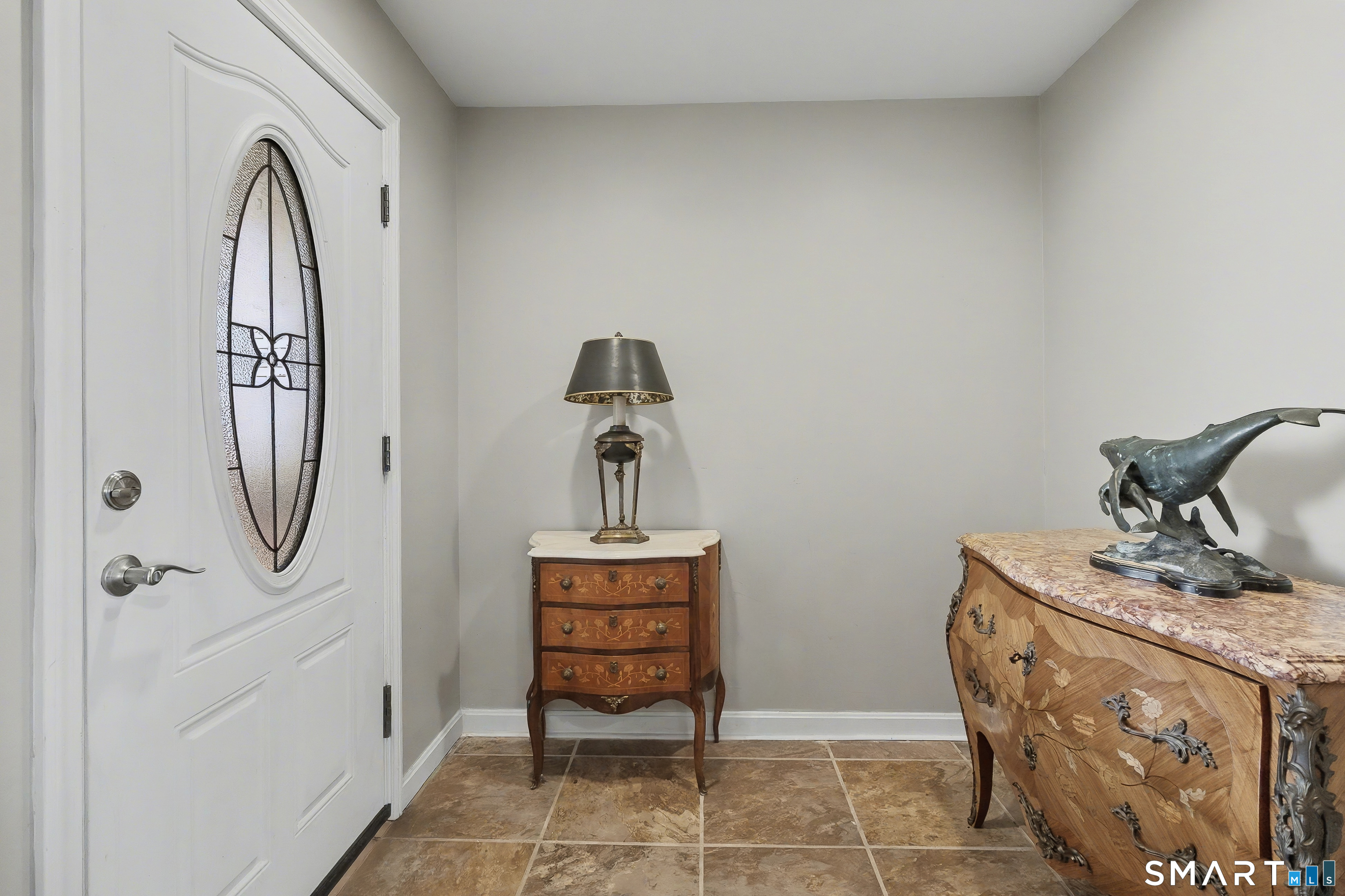51 Point Beach Drive Milford, CT 06460 - Photo 6 of 32 a view of storage and utility room with windows