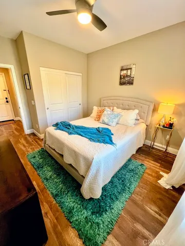 a bathroom with a sink a toilet and shower curtain