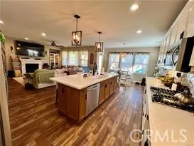 a view of a dining room kitchen furniture and a chandelier