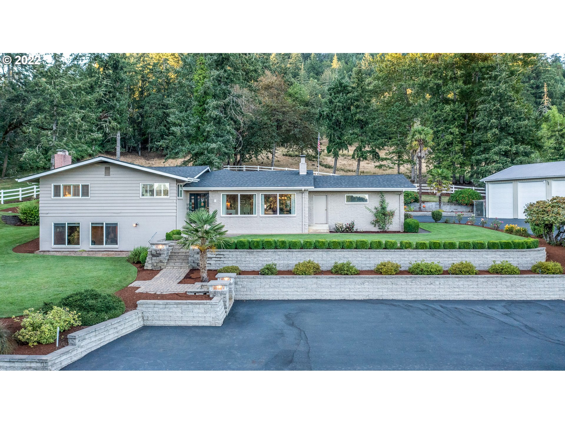 33315 Bloomberg Road Eugene, OR 97405 - Photo 1 of 32 a house view with a garden space