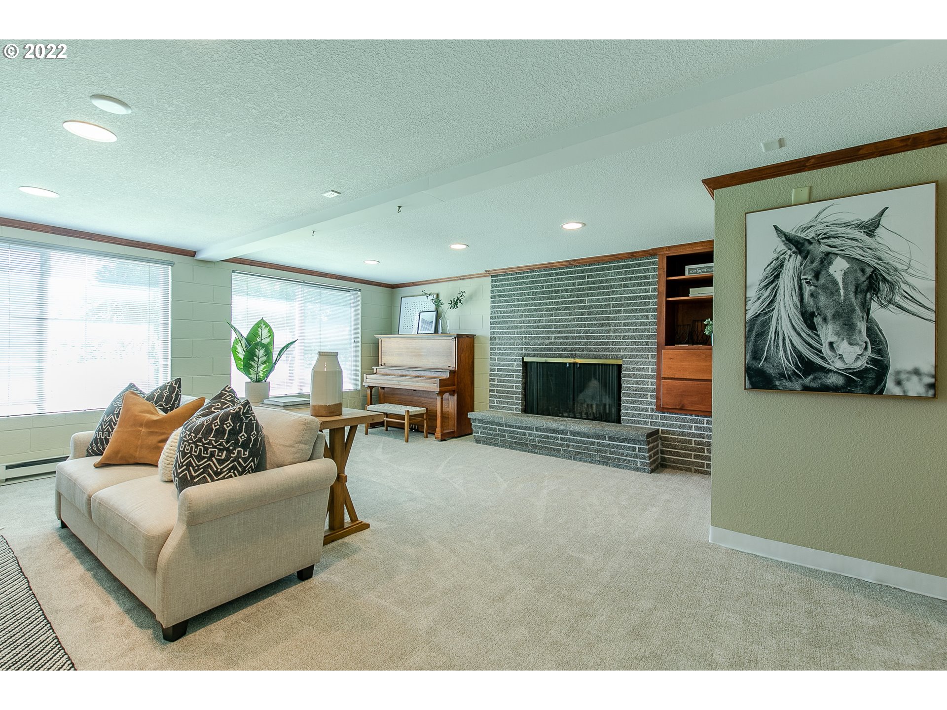 33315 Bloomberg Road Eugene, OR 97405 - Photo 24 of 32 a living room with furniture and a fireplace