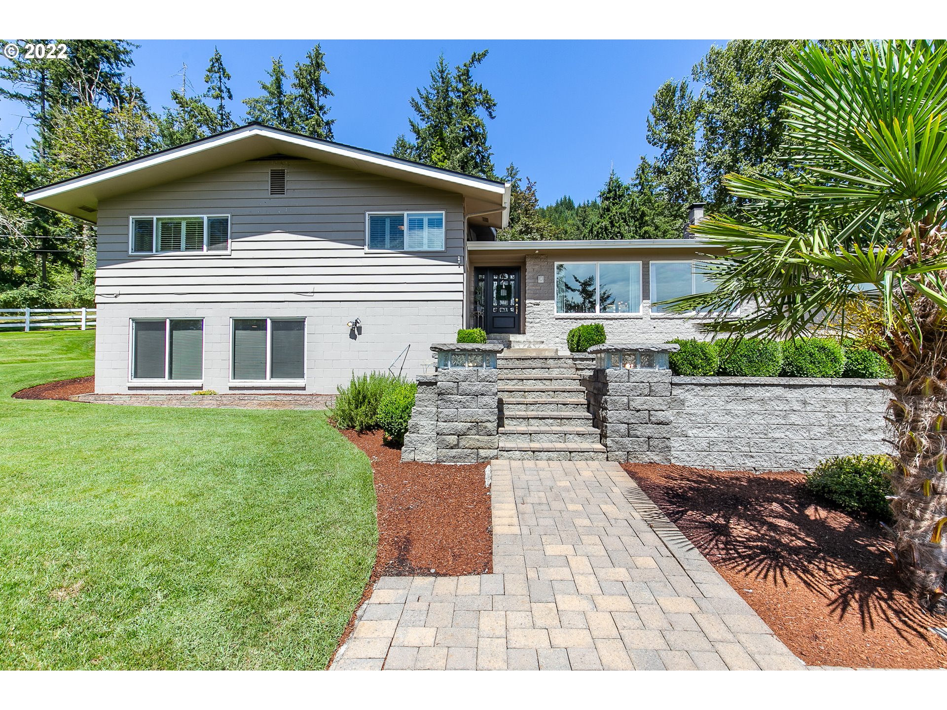 33315 Bloomberg Road Eugene, OR 97405 - Photo 6 of 32 a front view of a house with a yard