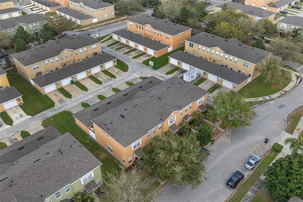 an aerial view of a house with a garden