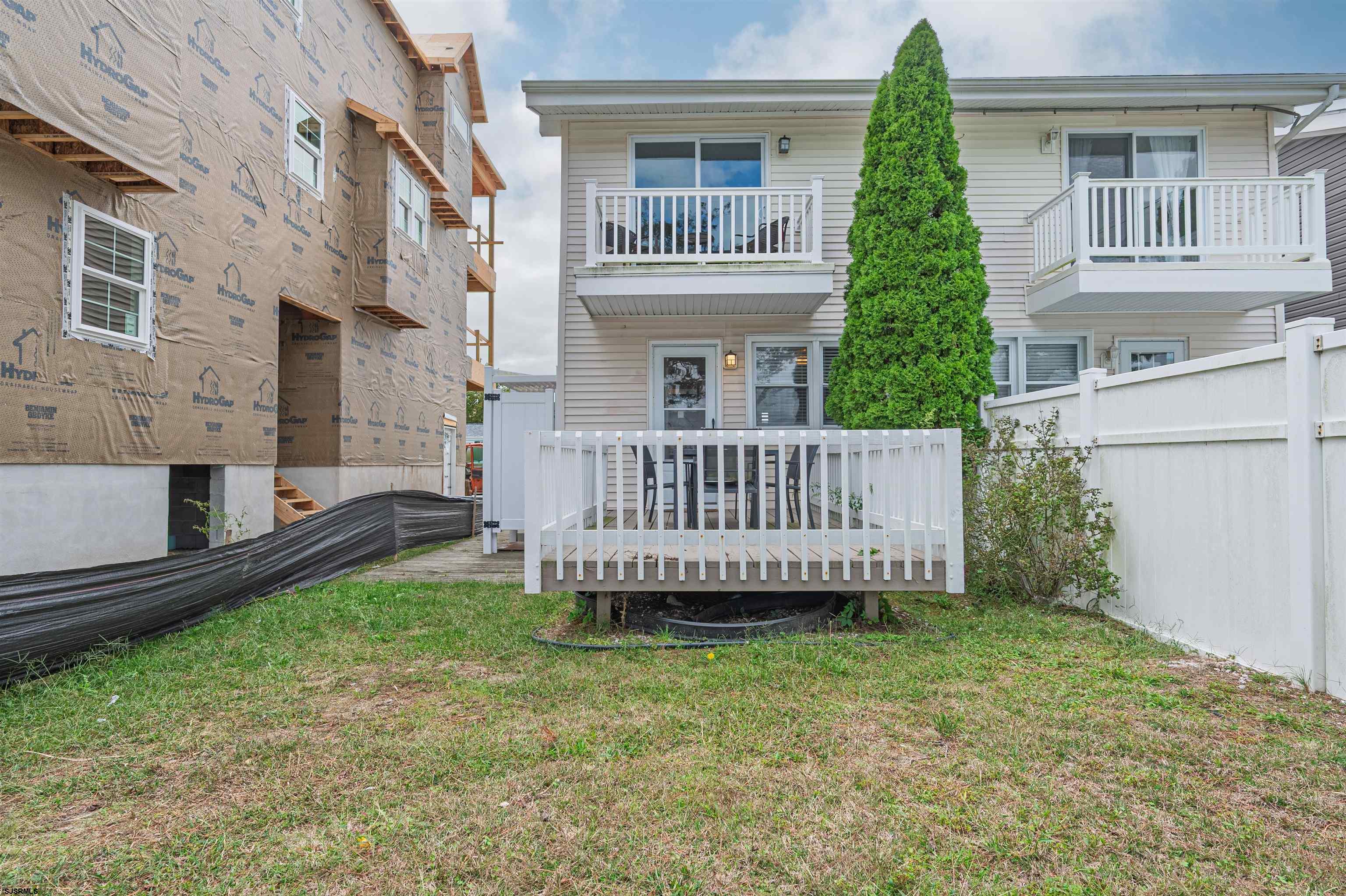 138 44th Street South, Unit D Brigantine, NJ 08203 - Photo 24 of 25 a view of a house with a yard and deck