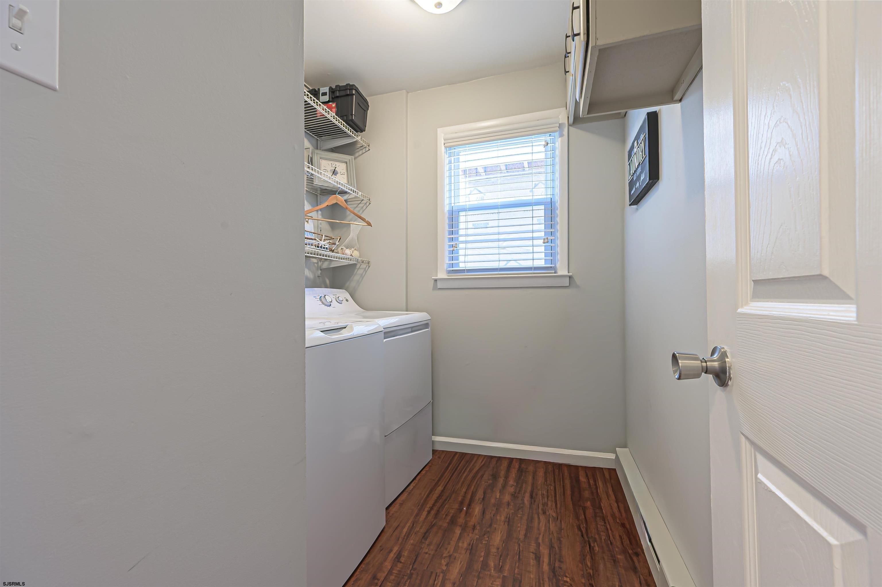 138 44th Street South, Unit D Brigantine, NJ 08203 - Photo 7 of 25 a room with a window and wooden floor