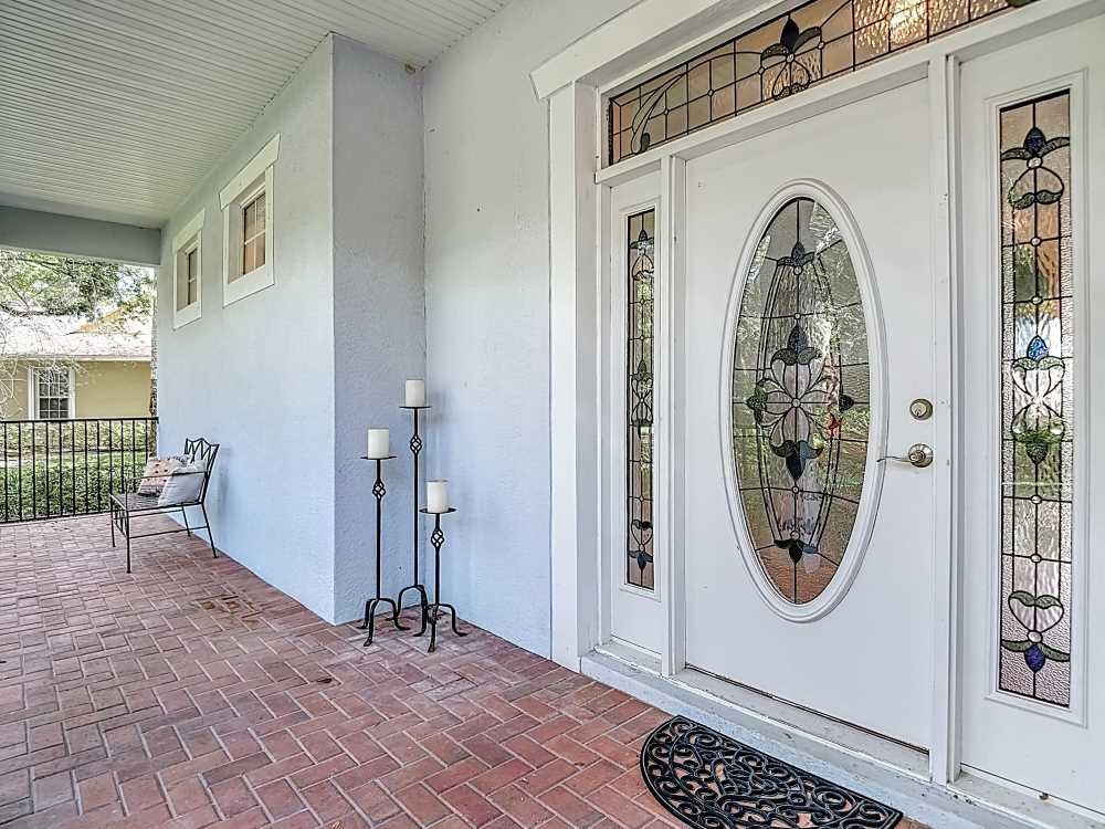 7330 36th Court Vero Beach, FL 32967 - Photo 19 of 33 a view of a livingroom with furniture and front door