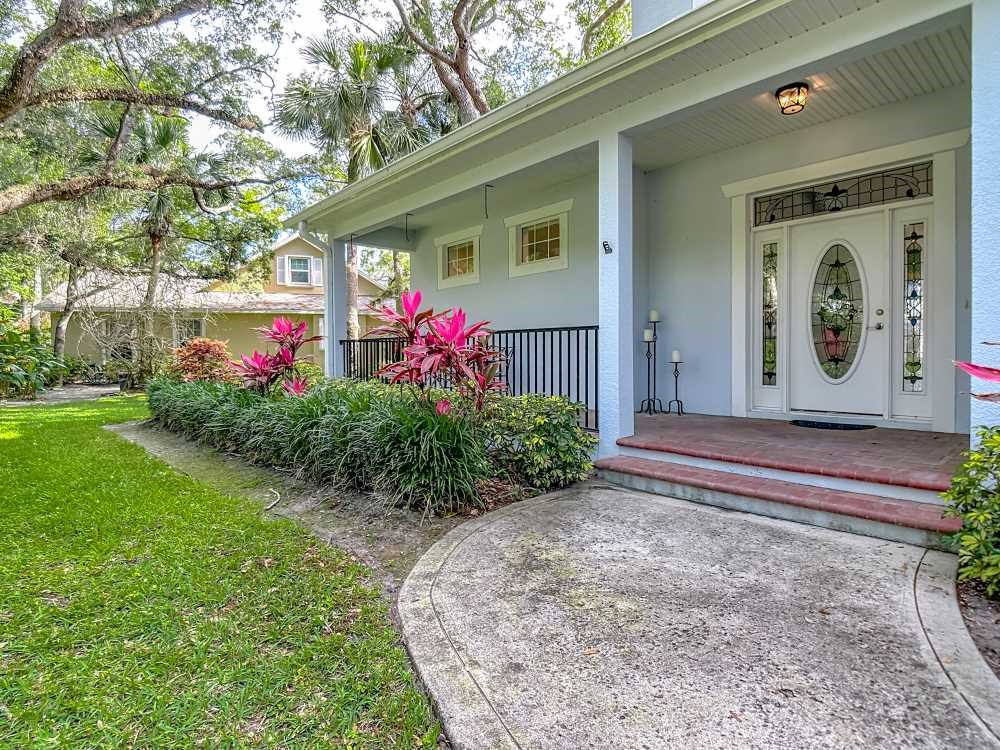 7330 36th Court Vero Beach, FL 32967 - Photo 21 of 33 a front view of house with yard