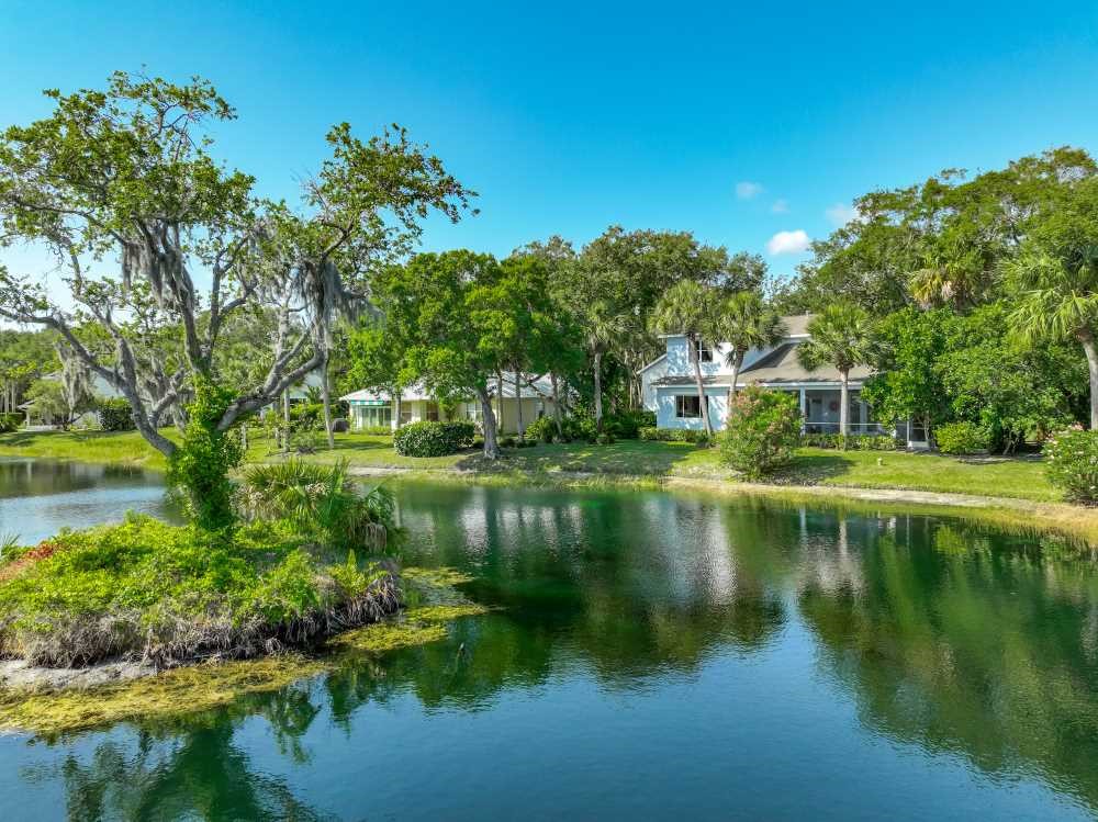 7330 36th Court Vero Beach, FL 32967 - Photo 25 of 33 a view of lake with green space