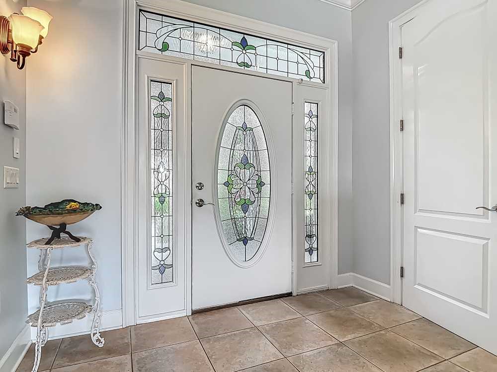 7330 36th Court Vero Beach, FL 32967 - Photo 29 of 33 a view of an entryway with wooden floor