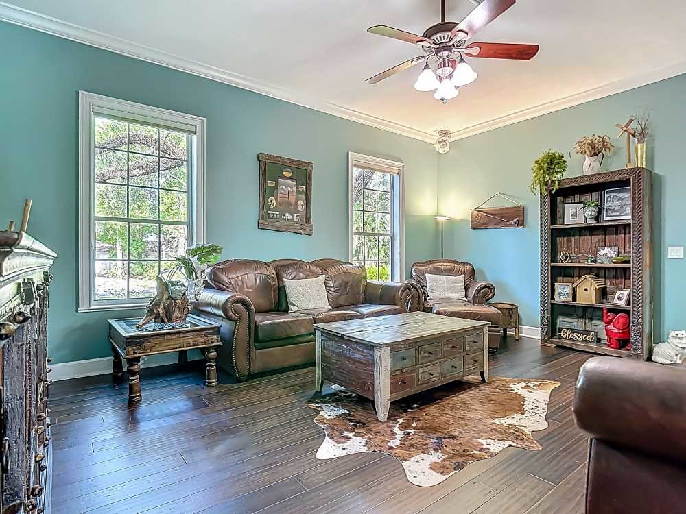 7330 36th Court Vero Beach, FL 32967 - Photo 7 of 33 a living room with furniture and a wooden floor