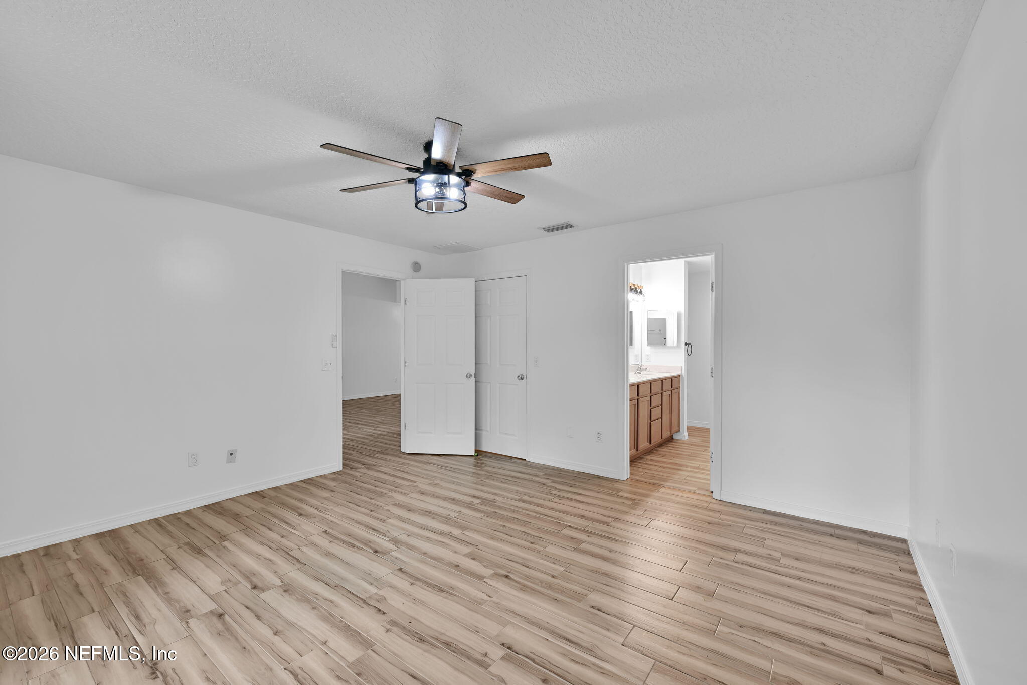 1110 Woodlawn Road, Unit D St. Augustine, FL 32084 - Photo 28 of 40 a view of an empty room with a window