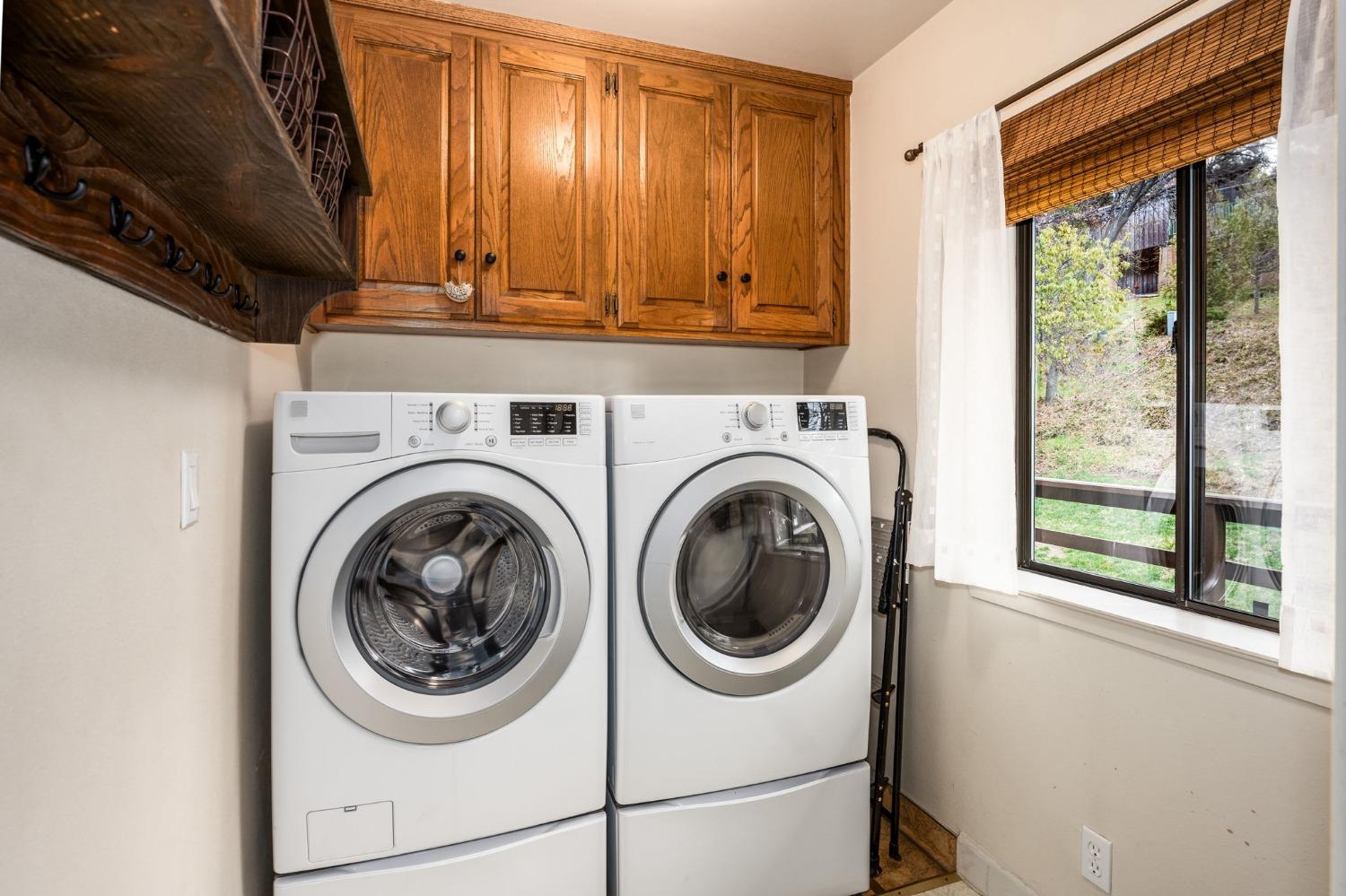 42538 Buckeye Road Oakhurst, CA 93644 - Photo 34 of 46 a utility room with dryer and washer