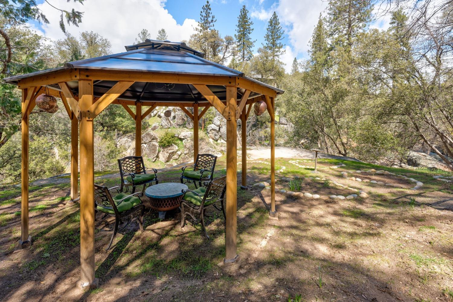 42538 Buckeye Road Oakhurst, CA 93644 - Photo 39 of 46 a view of yard with porch and outdoor seating