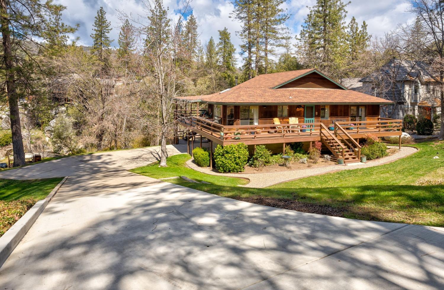 42538 Buckeye Road Oakhurst, CA 93644 - Photo 6 of 46 a view of a house with a yard