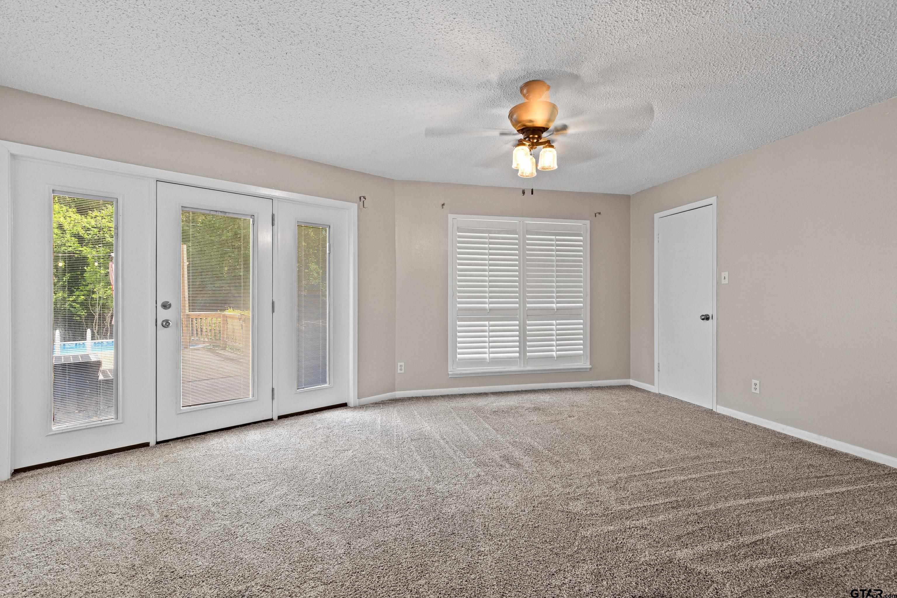 1821 Azalea Street Gilmer, TX 75644 - Photo 14 of 35 a view of an empty room with a window