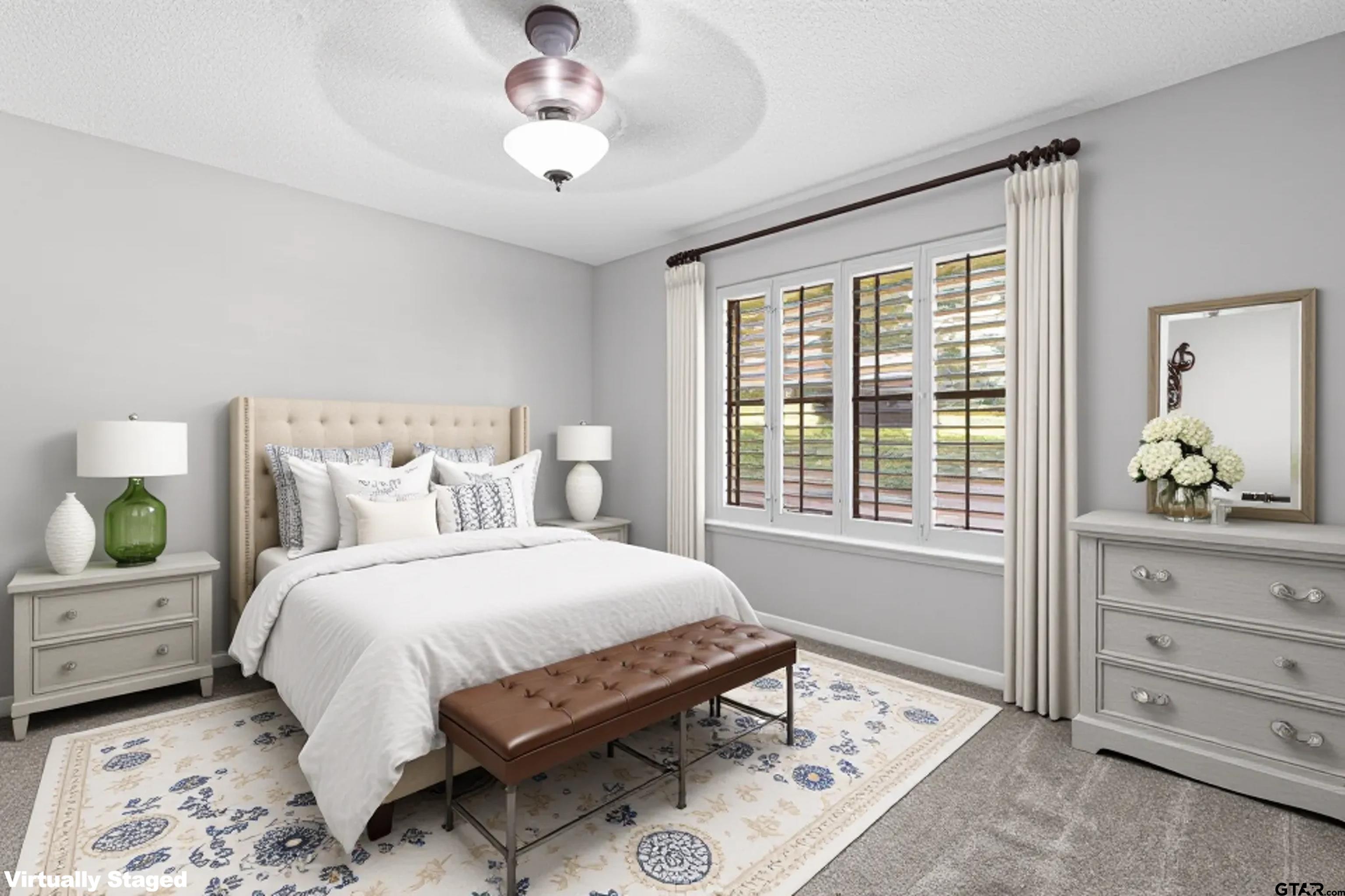 1821 Azalea Street Gilmer, TX 75644 - Photo 17 of 35 a bedroom with a bed and a window