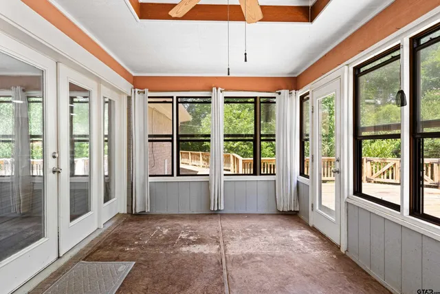 a view of an entryway with an empty room
