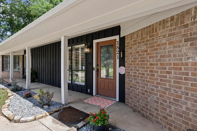 a view of a entryway door front of house
