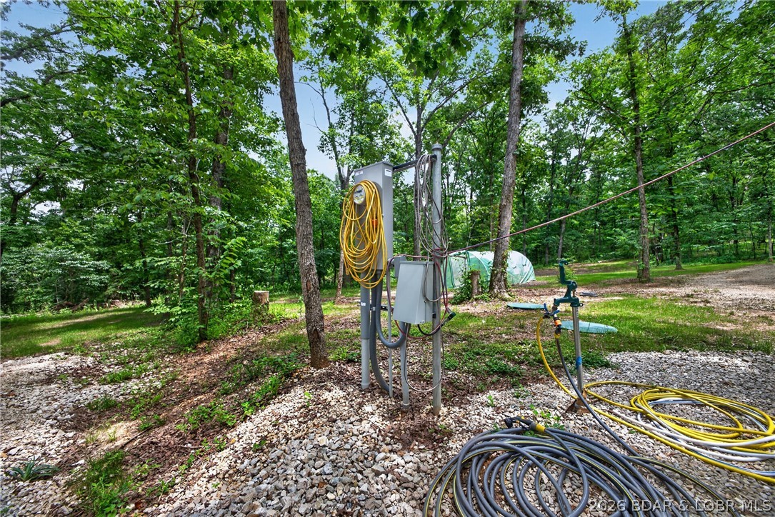 25145 State Route West Barnett, MO 65011 - Photo 39 of 58 2nd RV pad with hook ups, plumped to septic
