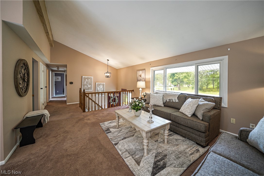 1198 Winchell Road Aurora, OH 44202 - Photo 2 of 28 Spacious living room. Hard wood floors under the carpet