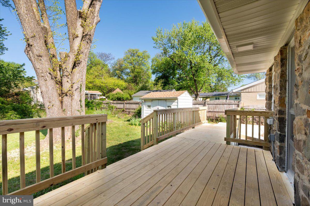 8068 Clark Station Road Severn, MD 21144 - Photo 32 of 35 Deck With A Few Steps Down To The Backyard