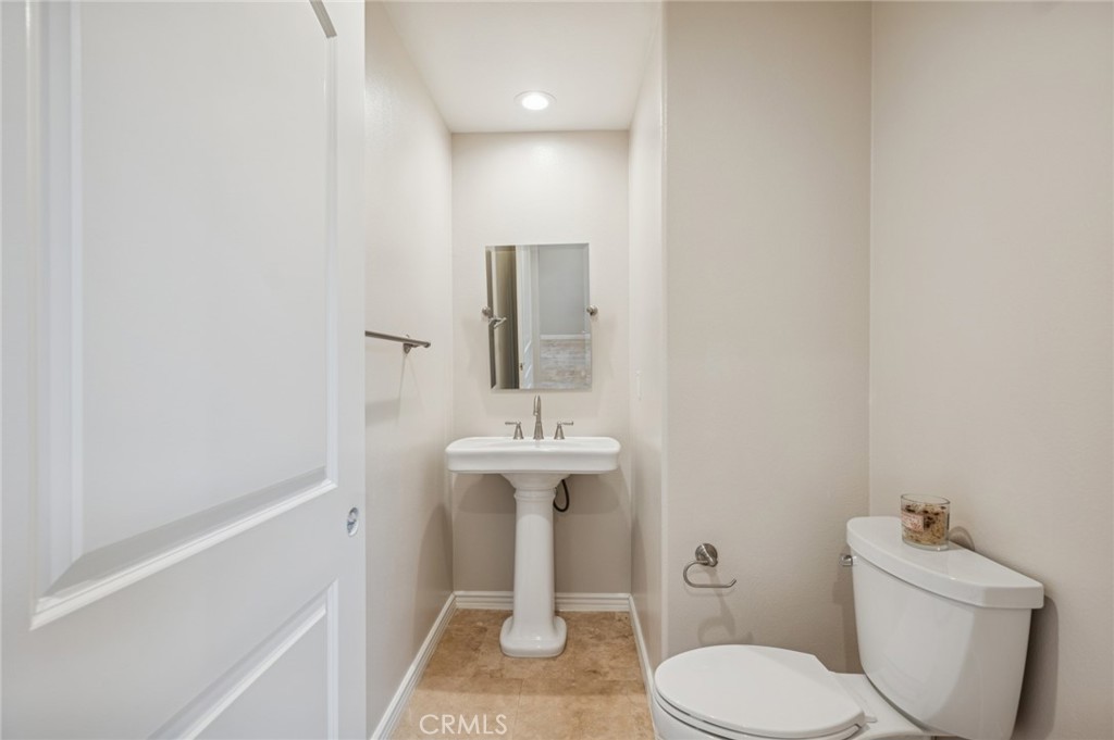 22 Ridge Valley Irvine, CA 92618 - Photo 15 of 37 a bathroom with a sink a toilet and shower
