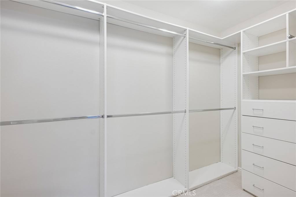 22 Ridge Valley Irvine, CA 92618 - Photo 19 of 37 a view of an empty walk in closet