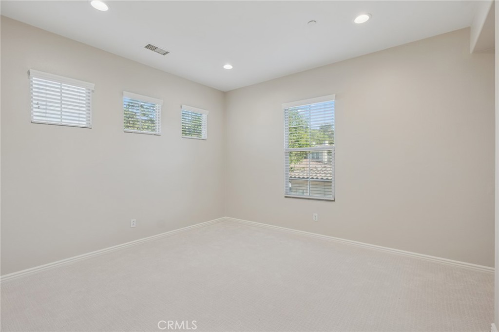 22 Ridge Valley Irvine, CA 92618 - Photo 21 of 37 an empty room with windows