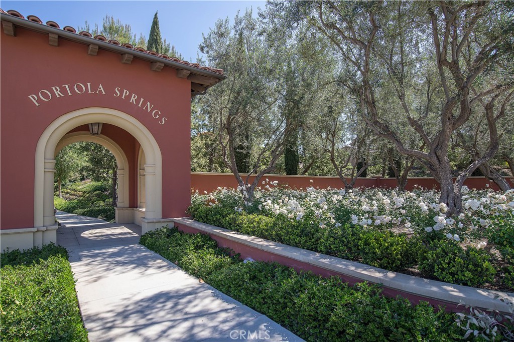 22 Ridge Valley Irvine, CA 92618 - Photo 29 of 37 a front view of a house with a garden